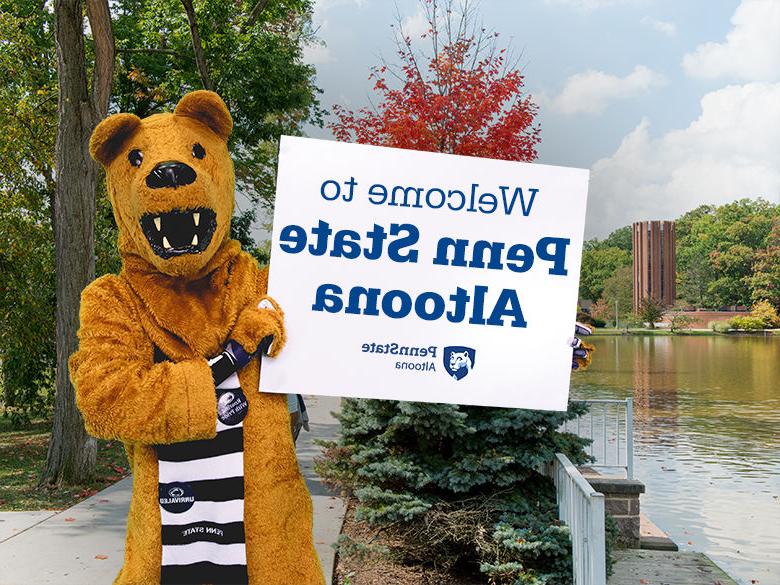 The Nittany Lion mascot holding up a sign reading Welcome to <a href='http://8ole.jbzhaoming.com/'>十大网投平台信誉排行榜</a>阿尔图纳分校